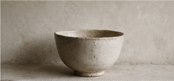 Handmade ceramic objects with imperfect surfaces